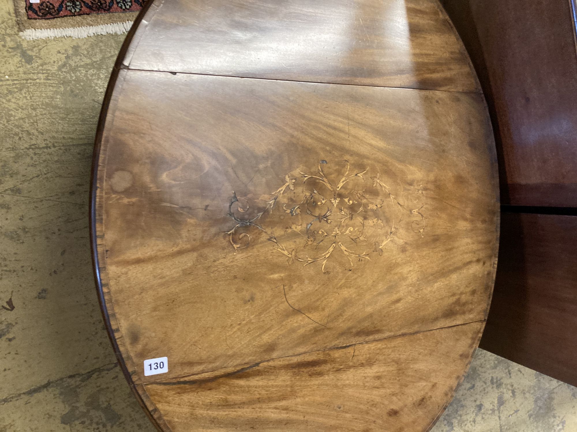 A George III marquetry inlaid oval mahogany Pembroke table, width 74cm, depth 46cm, height 66cm